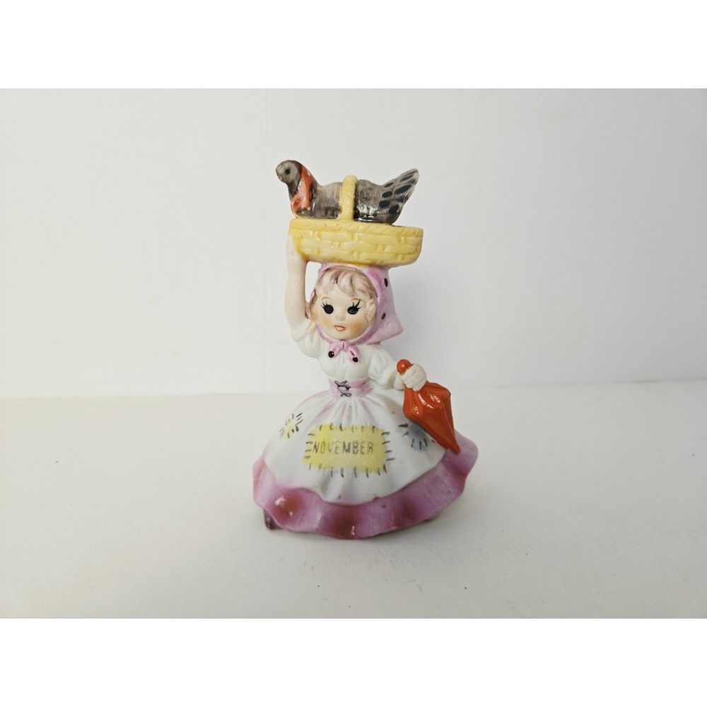 Vintage November girl figurine Birthday Thanksgiving turkey